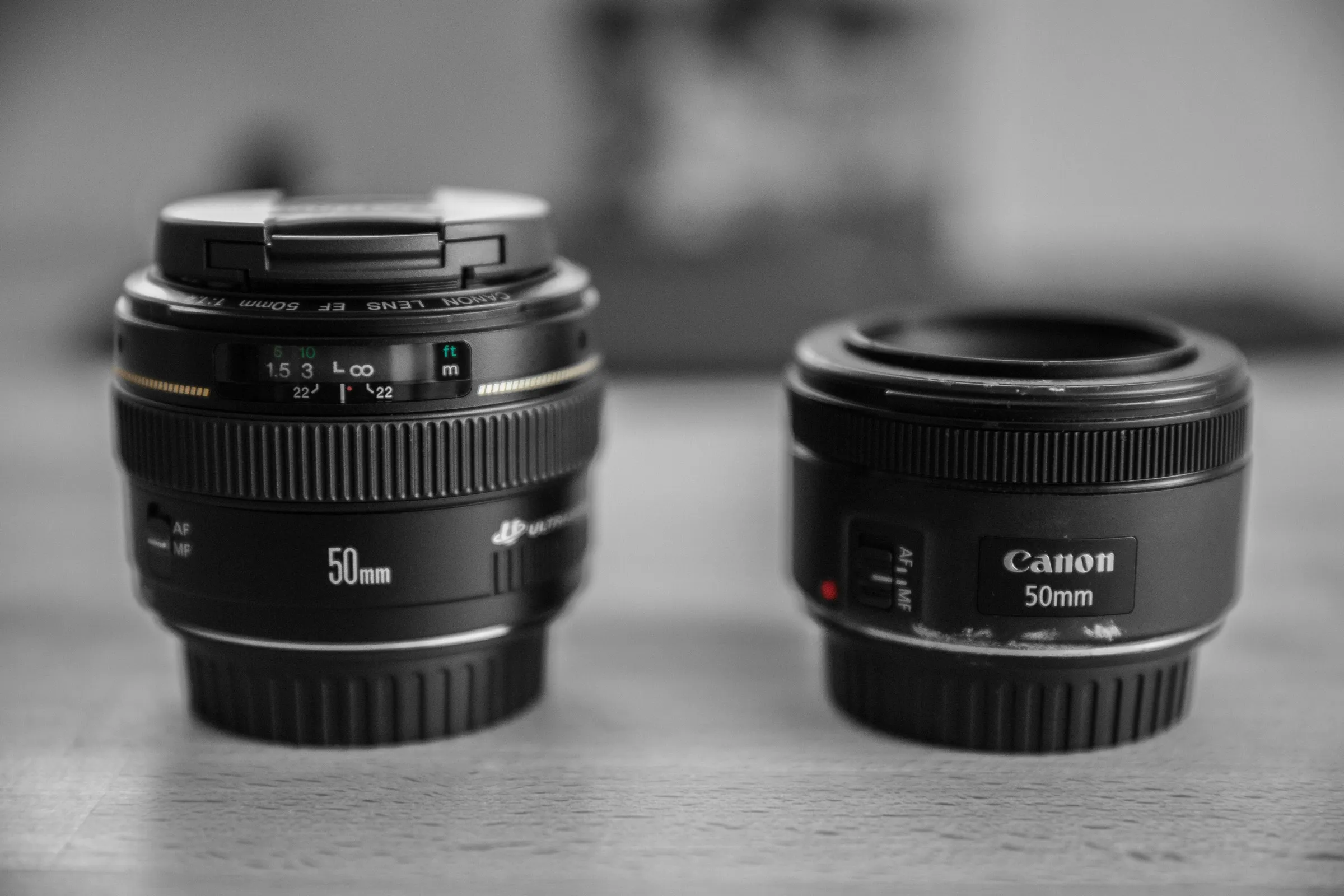 Two lenses side by side – wide-angle and telephoto